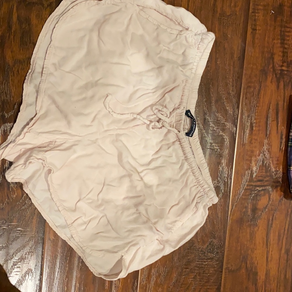 Brandy Melville light pink shorts.